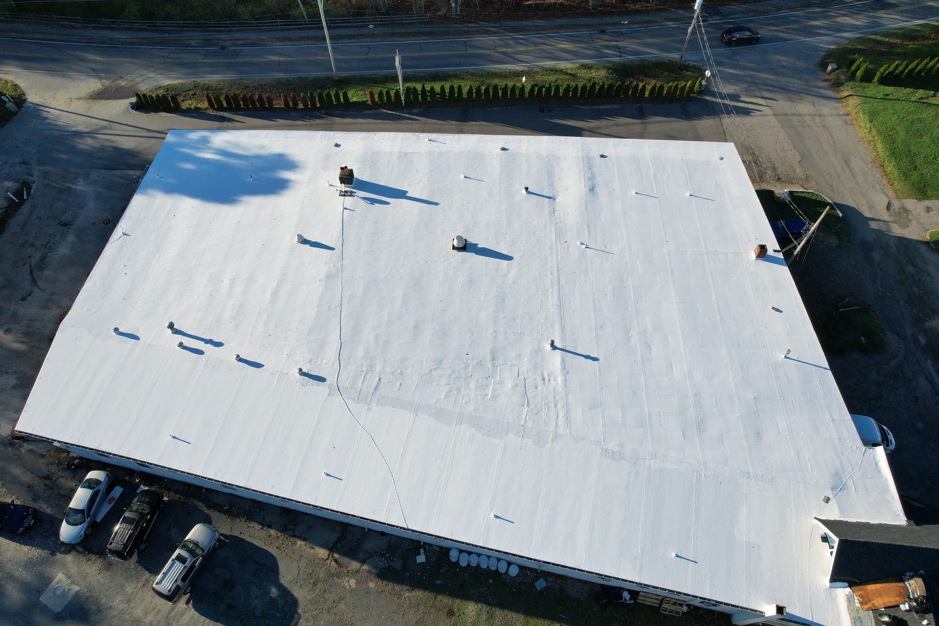 40,000+ sq ft white-membrane flat roof — HyTech Roofing, Cape Cod