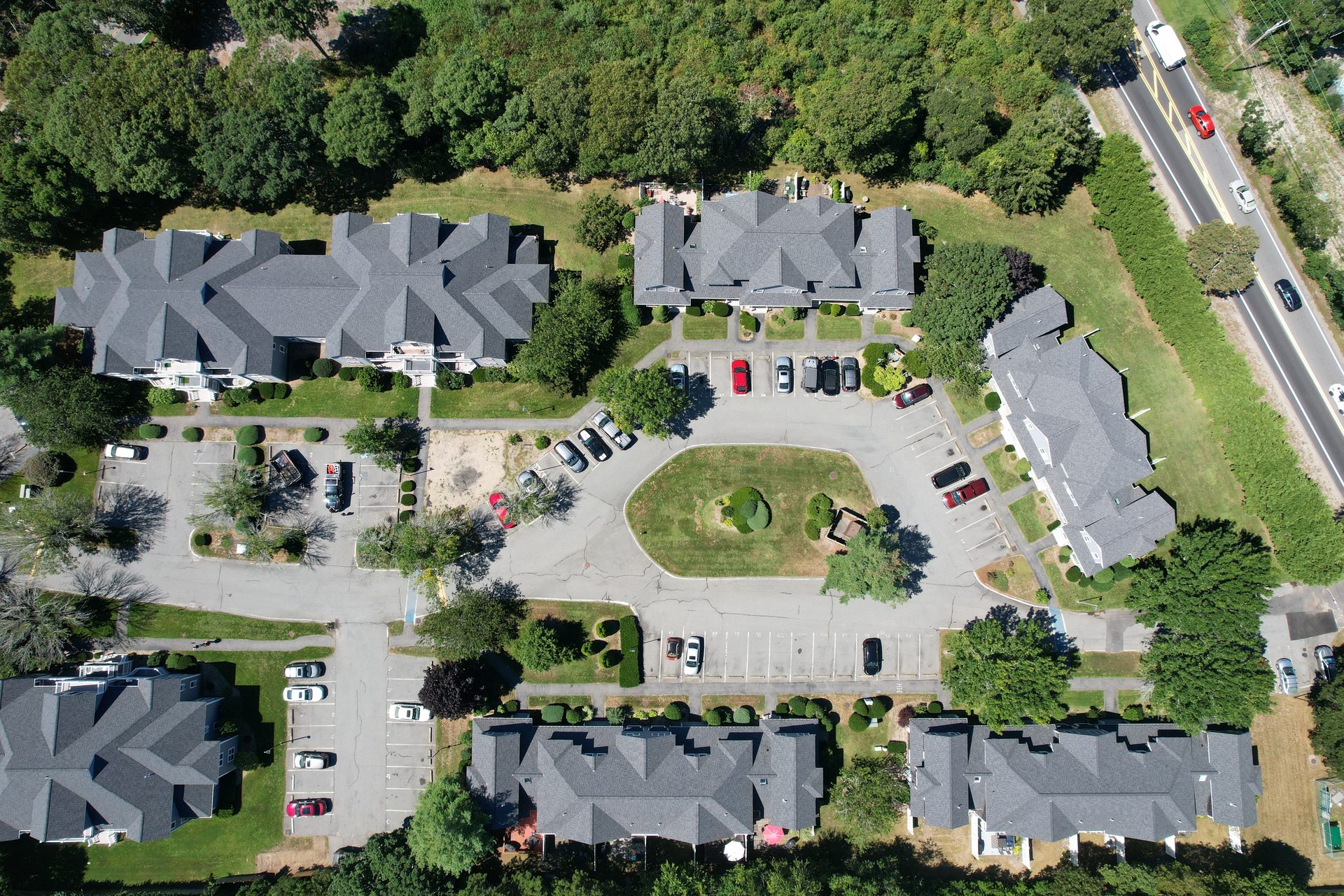 Multi-building reroofing program — HyTech Roofing, Cape Cod