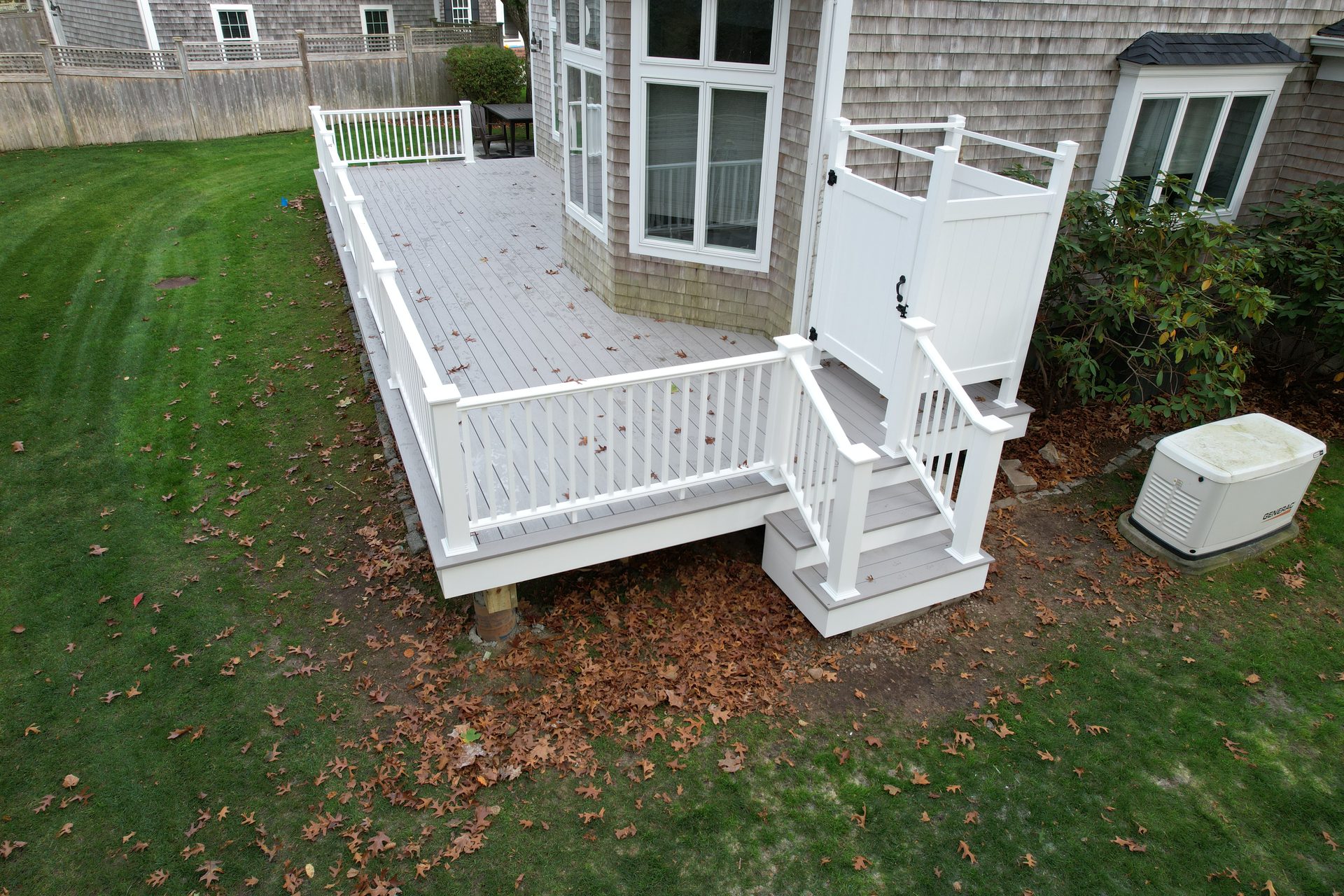 Multi-level pressure-treated deck build — HyTech Roofing, Cape Cod